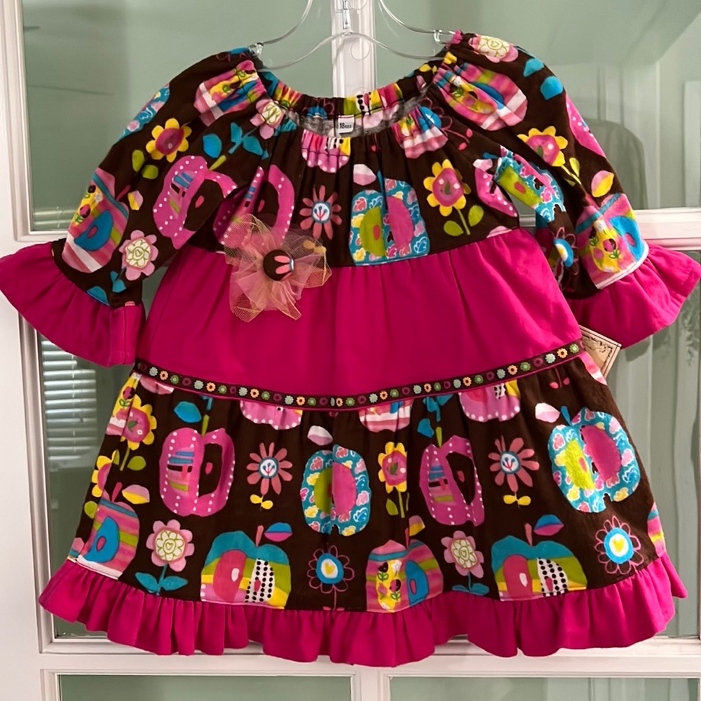 New handmade girls’ flannel dress in a size 18 months.